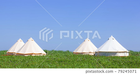 Glamping house in the nature. Blue sky fnd green grass. Glamping house in the nature. Blue sky fnd green grass. 79245071
