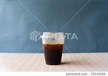 Iced coffee in a bra cup 79245089