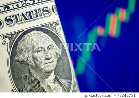 The concept of growth of the US dollar exchange rate. One dollar on a blue chart background. 79245751
