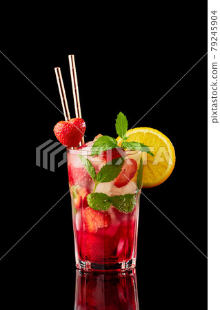 Strawberry mojito with lemon and mint isolated on black background with reflection Strawberry mojito with lemon and mint isolated on black background with reflection 79245904