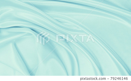 Smooth elegant blue silk or satin luxury cloth texture as abstract background. Luxurious background design Smooth elegant blue silk or satin luxury cloth texture as abstract background. Luxurious background design 79246146
