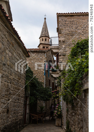 Belfry of St. John's Church seen from the alley of Budva, Montenegro Belfry of St. John's Church seen from the alley of Budva, Montenegro 79246948