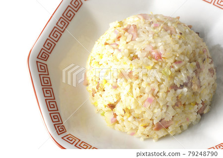 A bird's-eye view of hot five-eyed fried rice with various ingredients such as Narutomaki and char siu on a white background 79248790