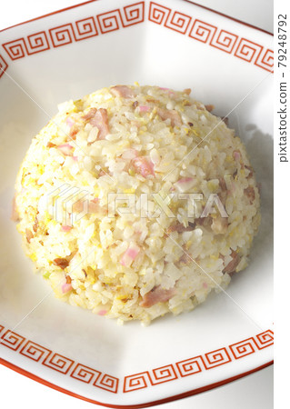 A bird's-eye view of hot five-eyed fried rice with various ingredients such as Narutomaki and char siu on a white background 79248792