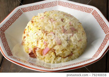 Hot five-eyed fried rice with various ingredients such as Narutomaki and char siu Hot five-eyed fried rice with various ingredients such as Narutomaki and char siu 79248838