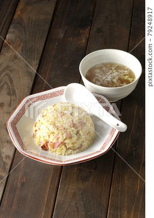 Hot Gomoku fried rice and Chinese soup with various ingredients such as Narutomaki and char siu Hot Gomoku fried rice and Chinese soup with various ingredients such as Narutomaki and char siu 79248917
