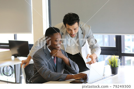 Millennial black businesswoman addressing colleagues at a corporate business meeting, close up 79249300