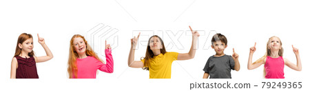 Art collage made of portraits of little and happy kids isolated on white studio background. Human emotions, facial expression concept Art collage made of portraits of little and happy kids isolated on white studio background. Human emotions, facial expression concept 79249365