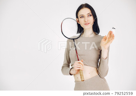 Girl with sports equipment on a white background Girl with sports equipment on a white background 79252559