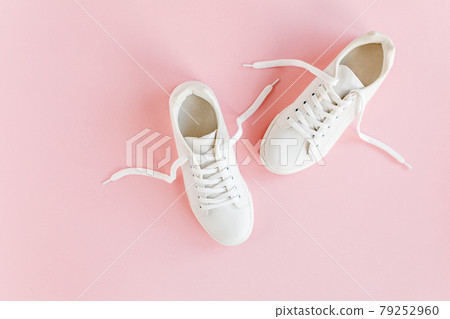 Woman clothes and accessories set on white background top view. modern and casual outfit. fashion, shopping and makeup concept. Flat lay, top view.  79252960