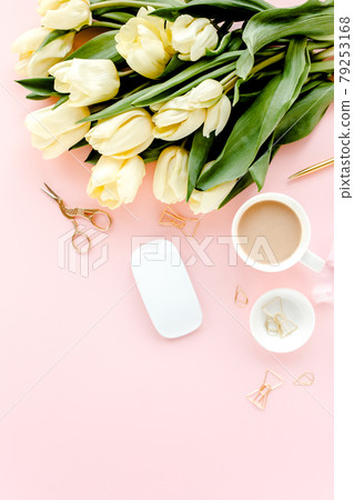 Female workspace with tulip flowers bouquet, golden accessories, diary, on pink background. Flat lay women's office desk. Top view feminine background 79253168