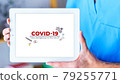 Tablet with visual information about the global virus and recommendations on how to prevent it 79255771