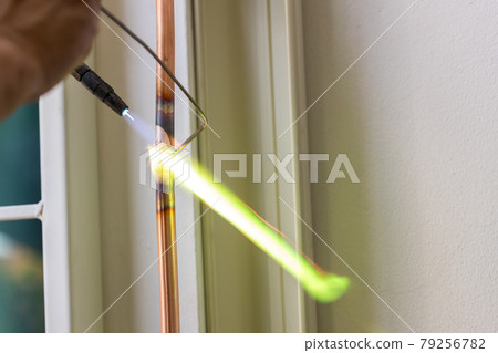 Welding of copper pipe of a methane gas pipeline  79256782