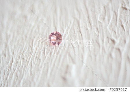 Pink Crystal Stone macro, pink transparent rough quartz crystals Pink Crystal Stone macro, pink transparent rough quartz crystals 79257917