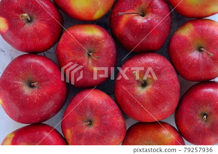 From above shot of tasty red apples flat lay. Gyration red ripe apples close-up. From above shot of tasty red apples flat lay. Gyration red ripe apples close-up. 79257936
