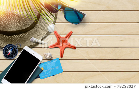 Summer vacation background with traveler accessories and seashells. Top view 79258027