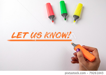 LET US KNOW. Text and colored markers on a white background 79261843