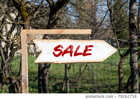SALE concept. Directional guidance arrow. Sunny day SALE concept. Directional guidance arrow. Sunny day 79262716