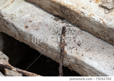 Concrete blocks and rusty fittings. Safety and the environment 79262768