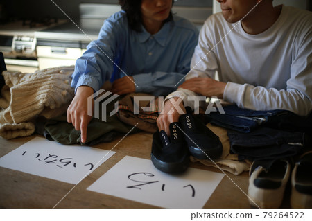 A couple organizing things A couple organizing things 79264522