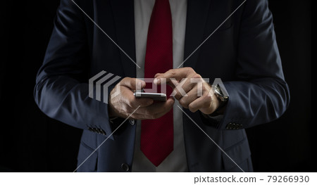 Close up of a man using mobile smart phone Close up of a man using mobile smart phone 79266930