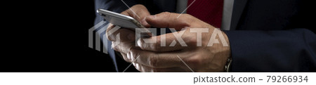 Close up of a man using mobile smart phone Close up of a man using mobile smart phone 79266934