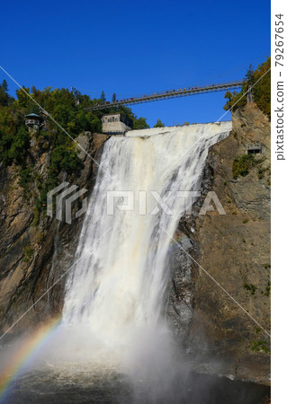 Waterfall that creates a rainbow Waterfall that creates a rainbow 79267654