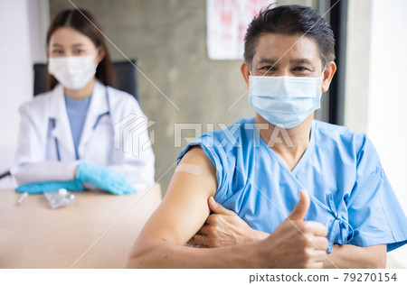 Asian young doctor syringe injection to the elder patient. health ideas concept. Problem talk at medical checkup visit with wheelchair . Asian young doctor syringe injection to the elder patient. health ideas concept. Problem talk at medical checkup visit with wheelchair . 79270154
