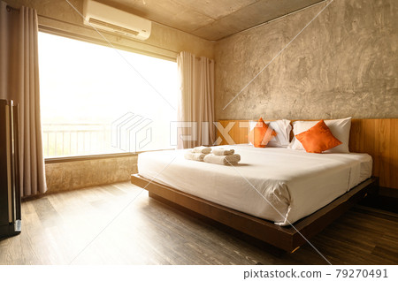 The comfortable hotel bedroom in cozy style. Conceptual of interior design in hotel. 79270491