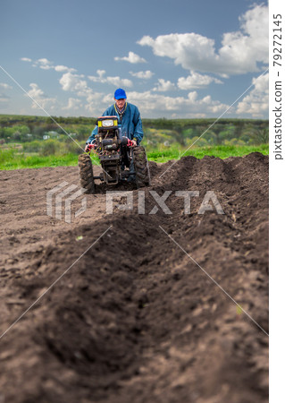 farmer and mini-farm equipment 79272145