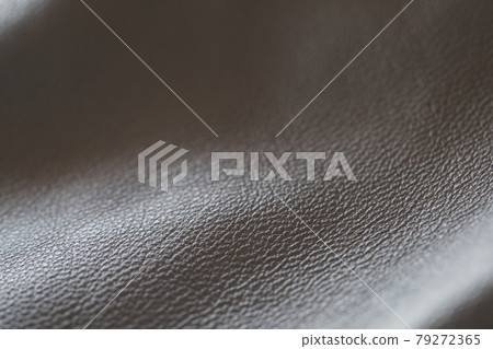 Closeup full grain gray brown leather background 79272365