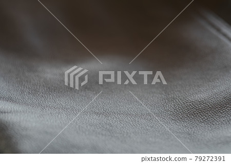 Closeup full grain gray brown leather clothes background Closeup full grain gray brown leather clothes background 79272391
