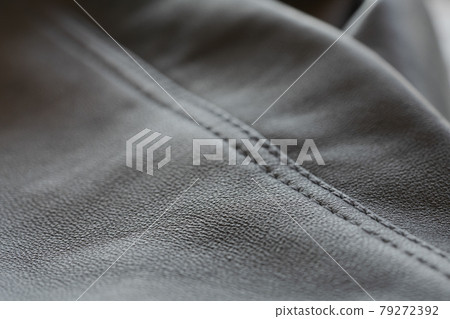 Closeup full grain gray brown leather clothes background Closeup full grain gray brown leather clothes background 79272392