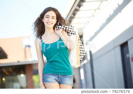 shopping at outlet store shopping at outlet store 79276578