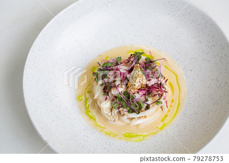 Crab meat in coconut cream soup and micro greens over gray concrete background. Top view, copy space. Healthy delicious breakfast Crab meat in coconut cream soup and micro greens over gray concrete background. Top view, copy space. Healthy delicious breakfast 79278753