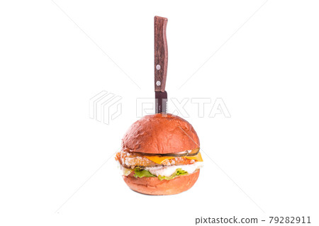 Chicken burger with knife isolated on white background. Delicious fastfood grilled fresh tasty burger, Fried Chicken Meat, Different type of sandwiches on white background. Chicken burger with knife isolated on white background. Delicious fastfood grilled fresh tasty burger, Fried Chicken Meat, Different type of sandwiches on white background. 79282911