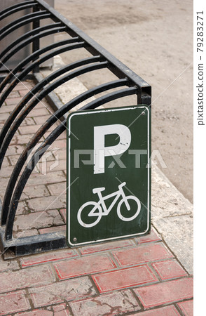 Bike parking. Bicycle parking frame wheelbender with sign Bike parking. Bicycle parking frame wheelbender with sign 79283271