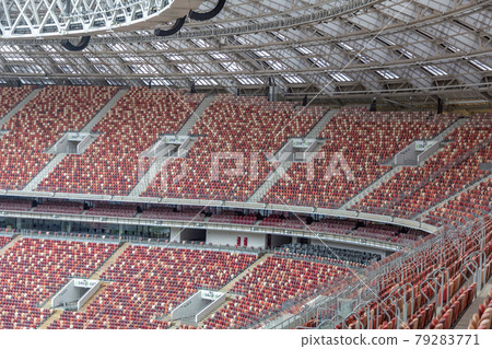 Empty seats on the tribune of a soccer stadium Empty seats on the tribune of a soccer stadium 79283771