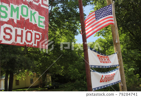Smoke Shop Sign and Flag in Rural East Texas Smoke Shop Sign and Flag in Rural East Texas 79284741
