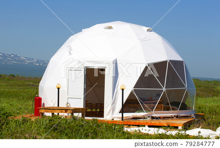 white geodome tent. Cozy glamping, holiday, vacation lifestyle concept. 79284777