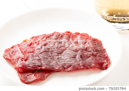 Beef jerky. (White background) Beef jerky. (White background) 79285764