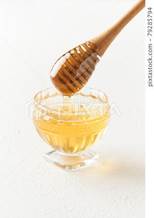 Honey and honey dipper Honey and honey dipper 79285794