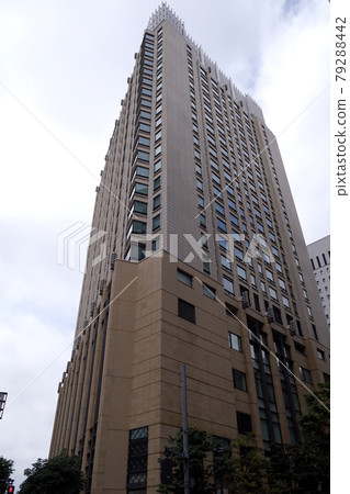 A building towering over the rainy season, Yurakucho, Tokyo 79288442