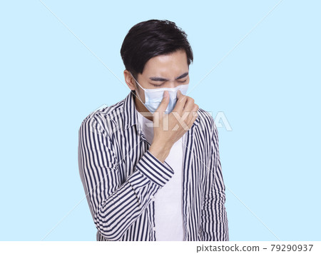 young man wearing  protective medical mask nose  79290937