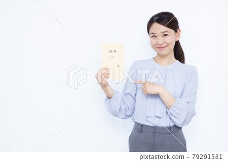 A business woman in her thirties with a smile and a salary bag A business woman in her thirties with a smile and a salary bag 79291581