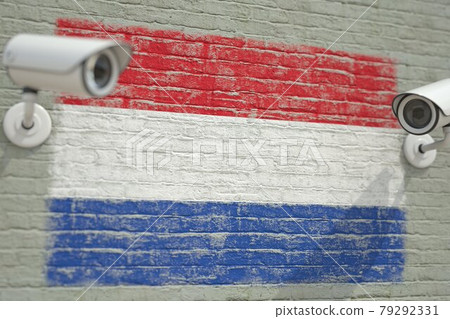CCTV cameras and wall with flag of Netherlands. Surveillance related 3D rendering 79292331