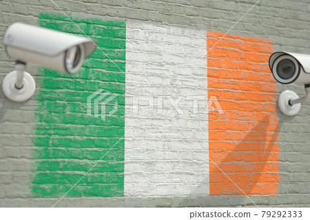 Surveillance cameras and wall with flag of Ireland. Modern security related 3D rendering 79292333