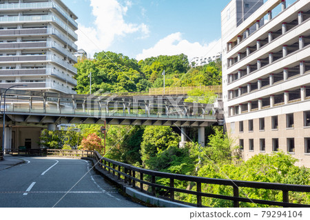 Commercial facility in the mountains on a sunny day 79294104
