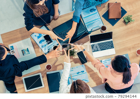 Teamwork business people join hands in meeting. Teamwork business people join hands in meeting. 79294144