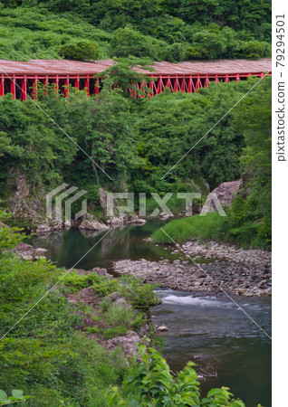 Red Snow Shed and Aburuma River in Uonuma City, Niigata Prefecture 79294501
